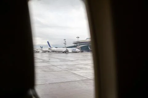 The view from the plane window to the parking lot where the planes Stock Photos