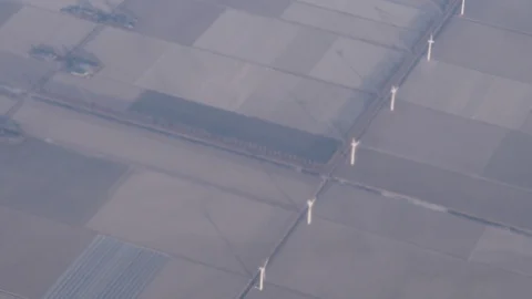 View from a plane window. Sea and wind farms Stock Footage 87209561