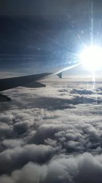 View from plane window. Sky view from plane window. Stock Photos