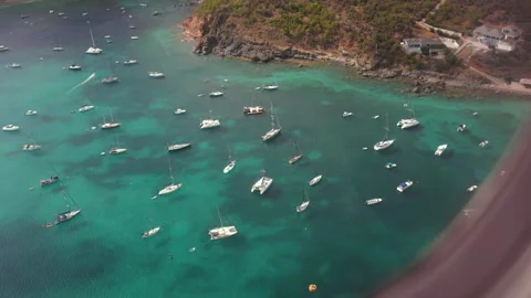 View from the plane window upon arrival in St Barth Stock Footage 285611538