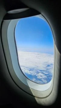 View from a plane window while traveling. Stock Photos