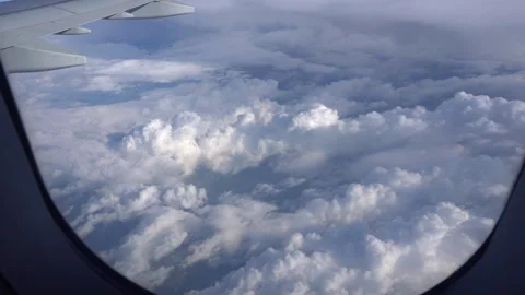 View from the plane window of the white clouds Stock-Footage 293281468