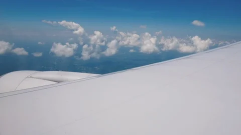 View from the plane window on the wing and the powerful jet engine Stock Footage 121405466