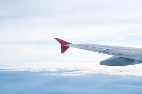 View from the plane on the wing and clouds Stock Photos