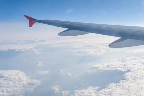 View from the plane on the wing and clouds Stock Photos