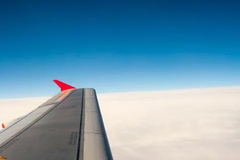 View from the plane on the wing and clouds Stock Photos