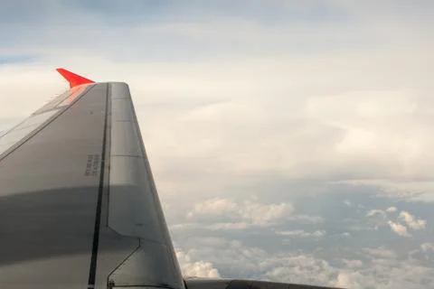 View from the plane on the wing and clouds Stock Photos