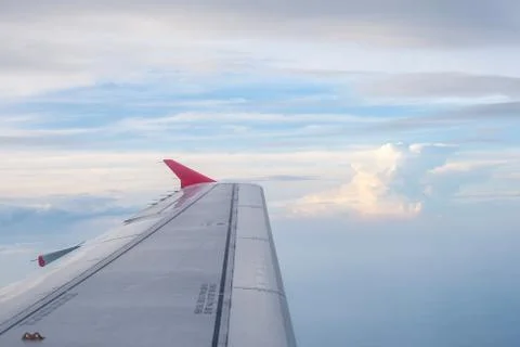 View from the plane on the wing and clouds Stock Photos