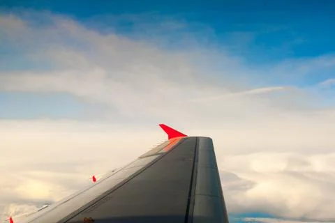 View from the plane on the wing and clouds Stock Photos