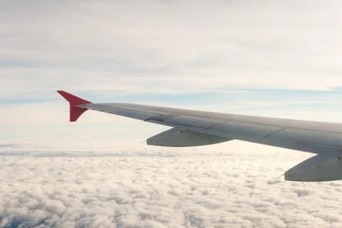 View from the plane on the wing and clouds Stock Photos