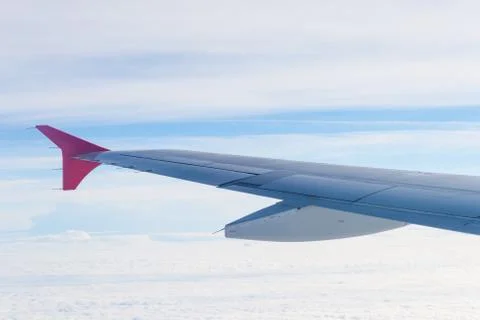 View from the plane on the wing and clouds Stock Photos