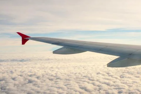 View from the plane on the wing and clouds Stock Photos