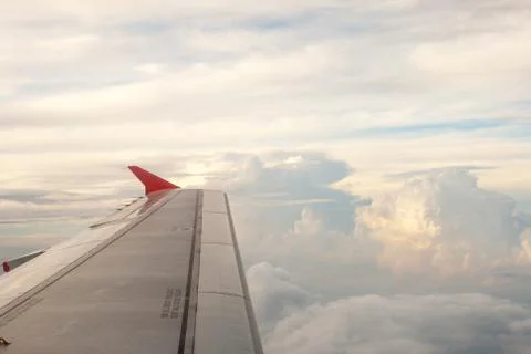 View from the plane on the wing and clouds Stock Photos