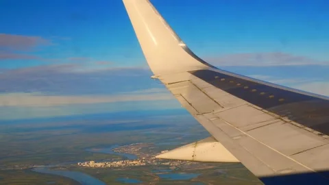 View from the plane's eluminator, under the wing of the hometown, which has not Stock Footage 168002665