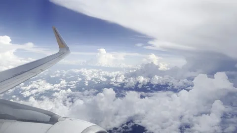 View from a plane's window showcases a well-angled shot of a plane's wings Stock Footage 232341602
