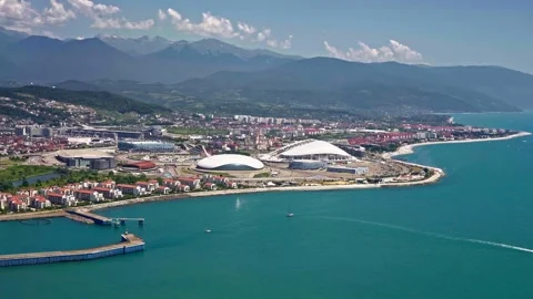 View from the plane's window to the Sochi Olympic Park and Imeretinskaya Bay Stock Footage 246908523