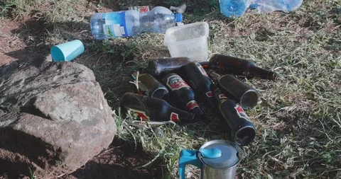 View of Plastic bottles and beer bottles on the ground 스톡 동영상 108493551