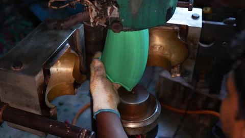 View of a plastic molding machine in Bogura, Bangladesh. Stockbeeldmateriaal 336425294