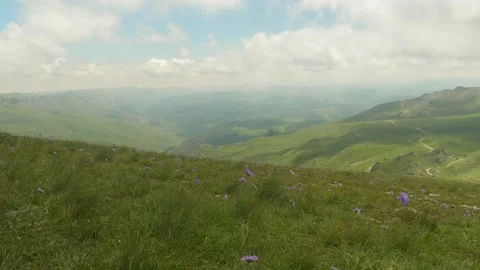View of plateau bermamyth part covered with green grass with white clouds above Stock Footage 139719450