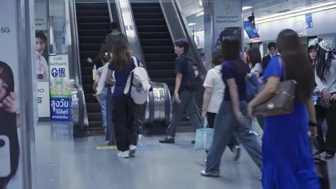 View at platform subway station while crowded of passenger using escalator .. Stock Footage 326624758