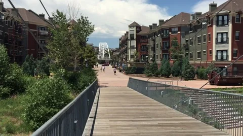A view from a Platte River pedestrian bridge that crosses over river in Denver, Stock Footage 68509475