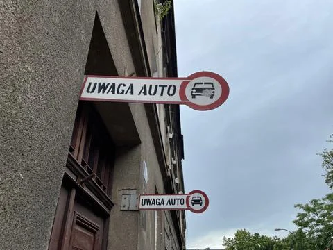 A view of  a polish sign  "UWAGA AUTO"  Poland -  site,translates "ATTENTION  Stock Photos