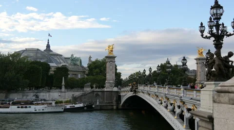 View of Pont Alexandre III, moored boats and the top of Grand Palais in Paris Stock Footage 59968003