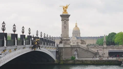 View of the Pont Alexandre III over the Seine River, Hotel des Invalides. Video stock 310200515