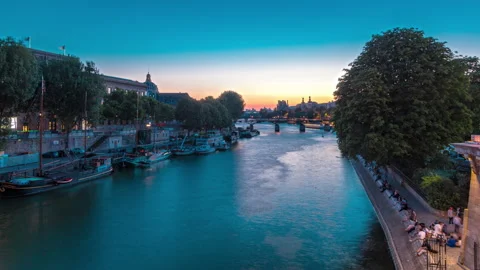 View to Pont des Arts in Paris after sunset day to night timelapse, France Stock Footage 236928416