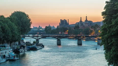 View to Pont des Arts in Paris after sunset day to night timelapse, France Stock Footage 236931209