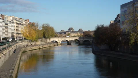 View of Pont Saint-Michel bridge over the Seine River in Paris on a sunny Stock Footage 320452101