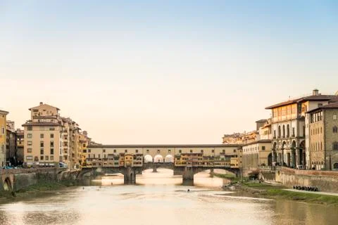 View of the Ponte Vecchio over the Arno River as it passes through Florence Stock Photos