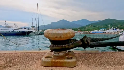 View of the port with bollard in the foreground Stock Footage 310992216