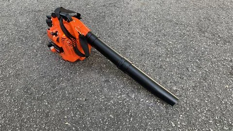 View of Portable orange leaf blower Stock Photos