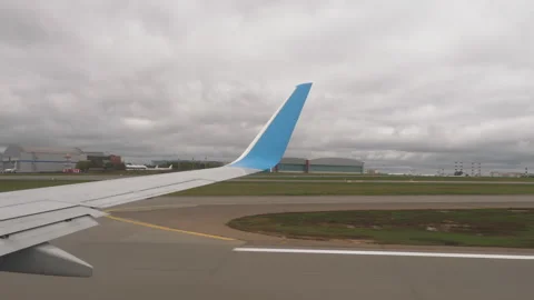 View from porthole during takeoff Stock Footage 291565030