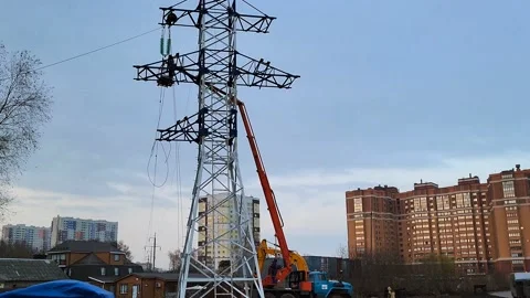View of the power line installation of the line Stock Footage 221081485