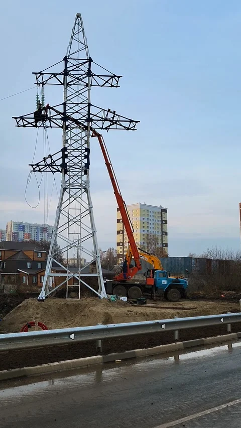 View of the power line installation of the line Stock Footage 221081487