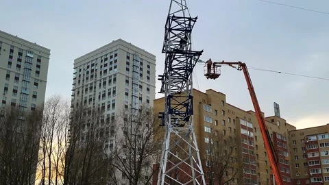View of the power line installation of the line Stock Footage 221081718