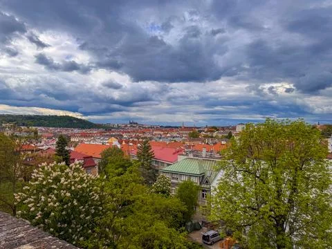 View of Prague's red-tiled roofs and historical buildings from Vysehrad for.. Stock Photos