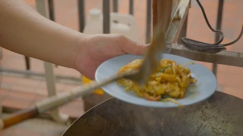 View of Preparing indomie on a cooking pot and serving on the plate Video stock 108797578