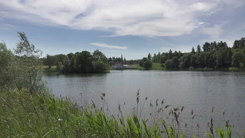 View of Priory Palace or castle in Gatchina on southeast shore of Black Lake Video stock 115054468