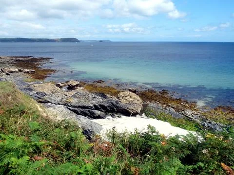 View of pristine coast of Southern Cornwall, from coastal path, UK Foto stock