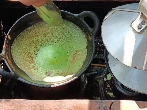 View of the process of making pancakes on the street Stock Photos