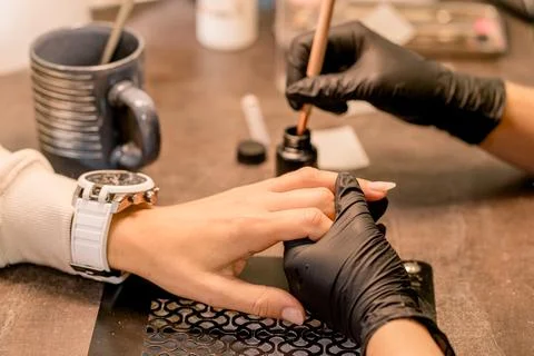 View of the process of a manicure being performed by a master Stock Photos