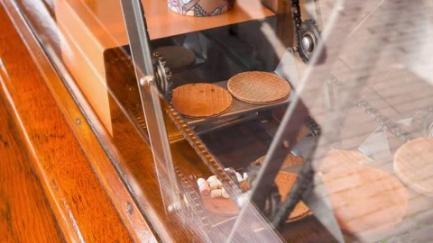 View of the process in stroopwaffle making in a shop in Gouda Stock Footage 283498144