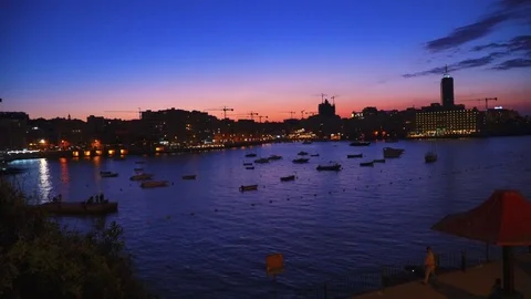 View at promenade and St Pauls harbour bay in Malta 4k Video Stock Footage 80353980