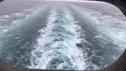 View of the propeller wash of a merchant ship Stock Footage 313520766