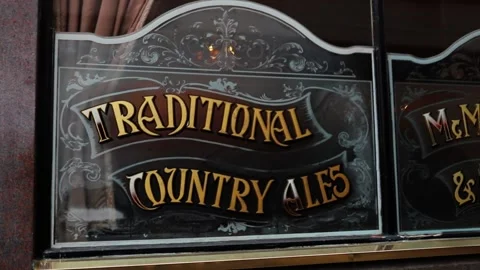View of a Pub Window with a Traditional Country Ales Sign Stock Footage 140355490