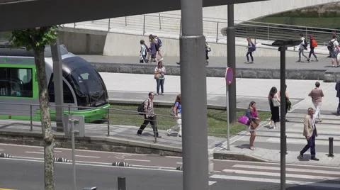 A view of public ground transportation train tram Bilbao, Spain on a summer day Stock Footage 64299556
