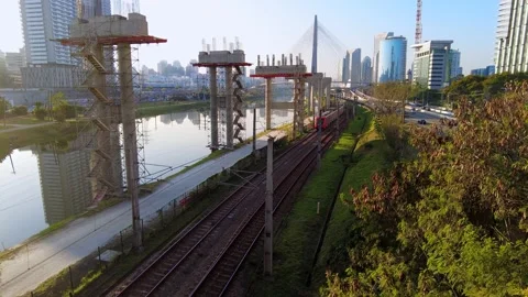 View of public train, traffic of vehicles, river, Marginal Pinheiros Avenue Stockbeeldmateriaal 158861853